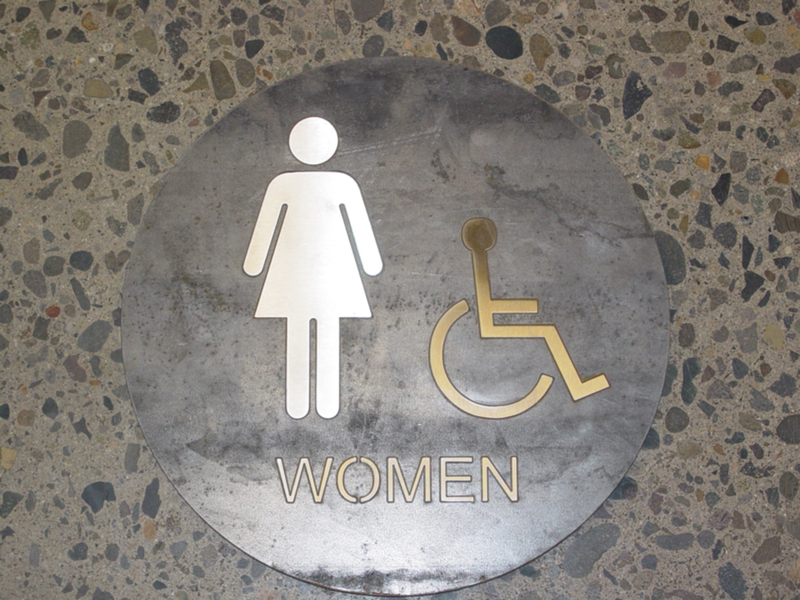 Stainless and Hot Rolled Steel Restroom Sign (Women)
